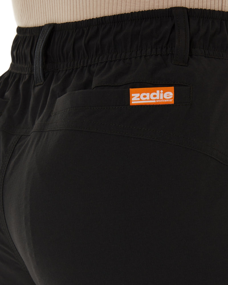 Back view of Zadie Workwear's black work shorts, highlighting the elastic waistband and pocket design.