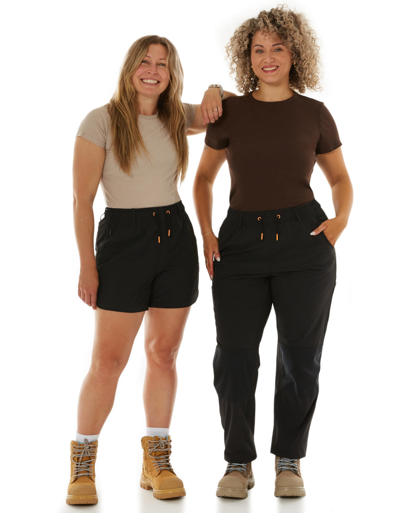 Model showcasing Zadie Workwear's 'Workz Pant' in a worksite setting, emphasizing functionality and style.