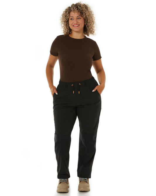 Side view of Zadie Workwear's women's work pants in black, featuring side pockets and durable stitching.