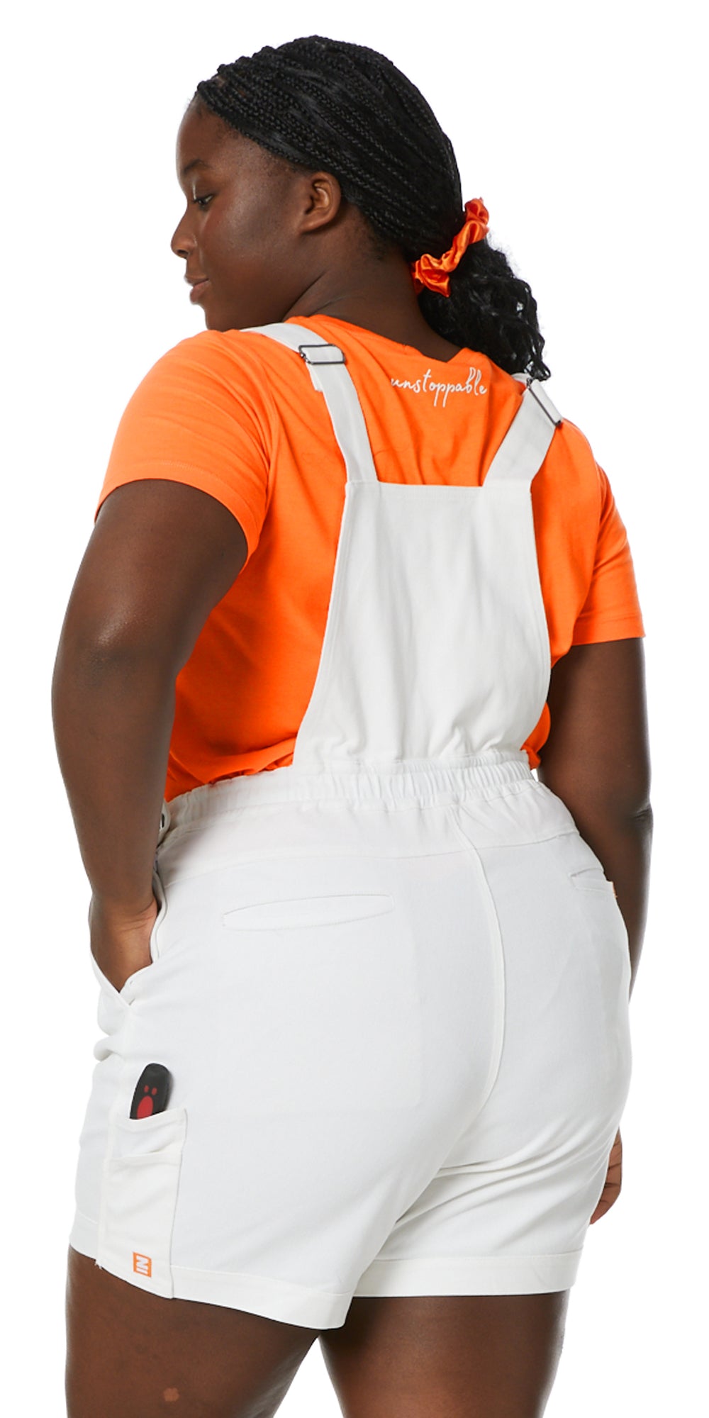 Side view of a model in fitted workwear trousers.