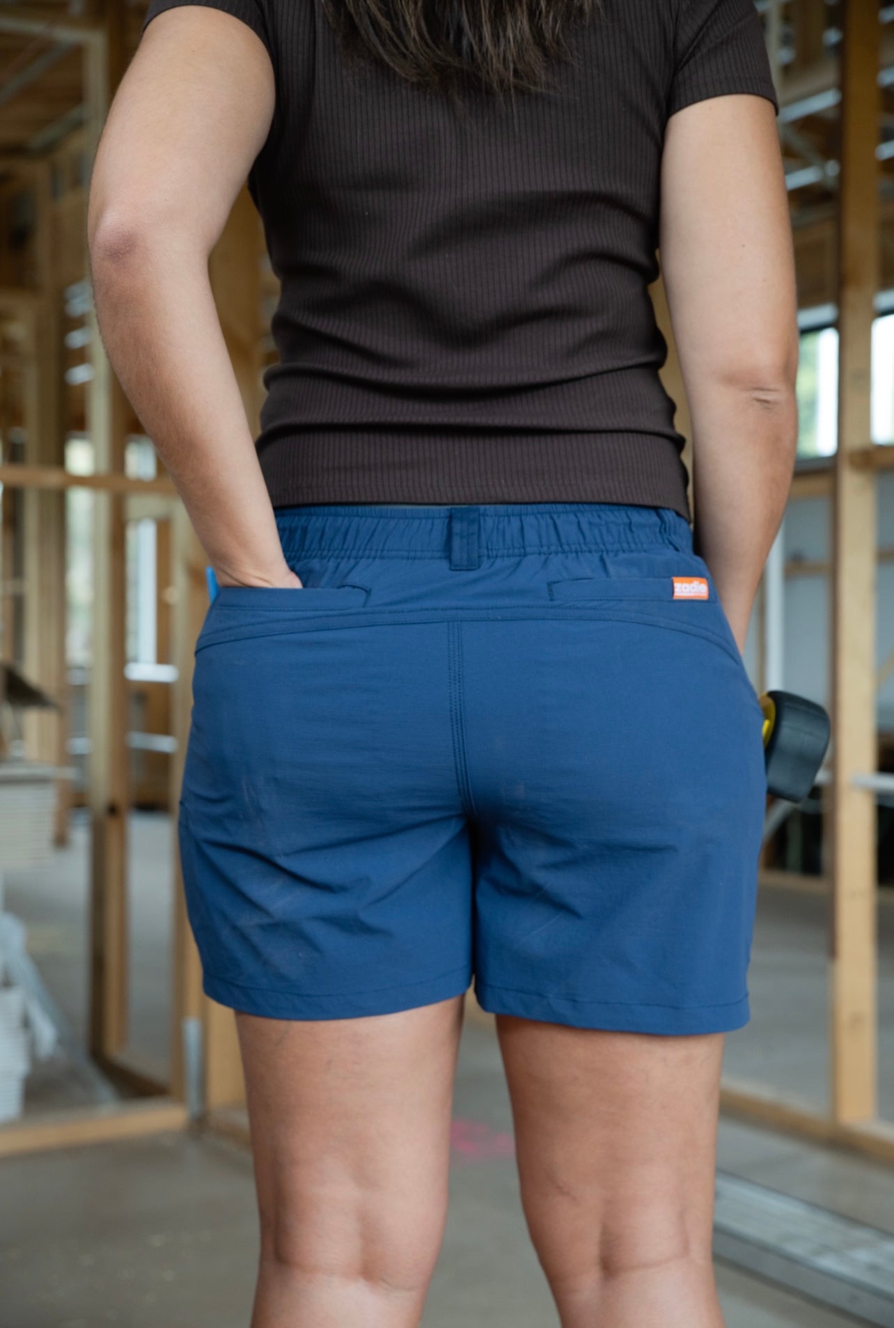 Close-up of Zadie Workwear overalls, showcasing fabric and pocket detail