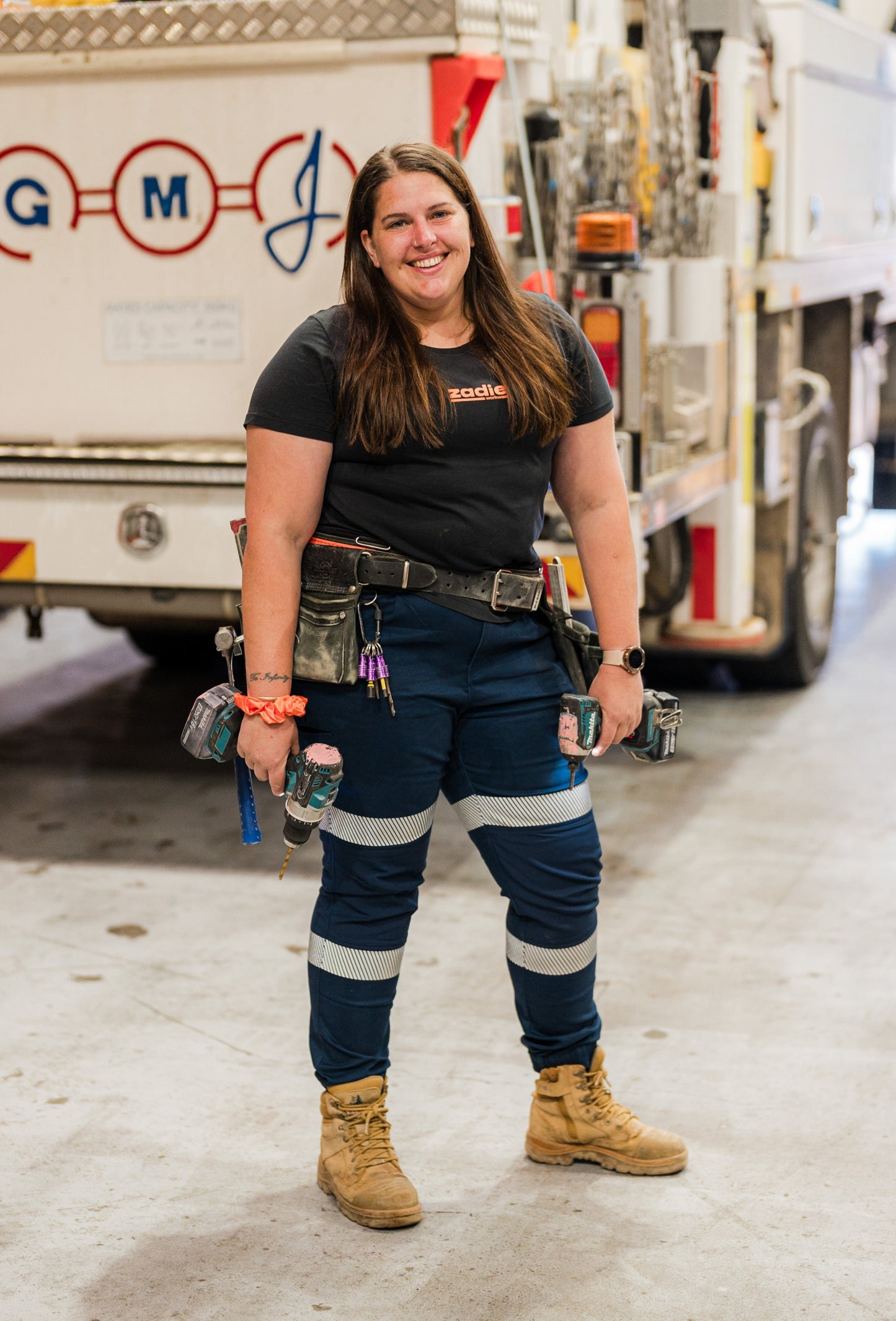 Full-length workwear outfit featuring a tailored fit and safety features.