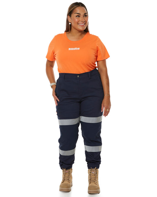 Close-up of Navy Middy Pant with reflective tape, emphasizing safety features for workwear.